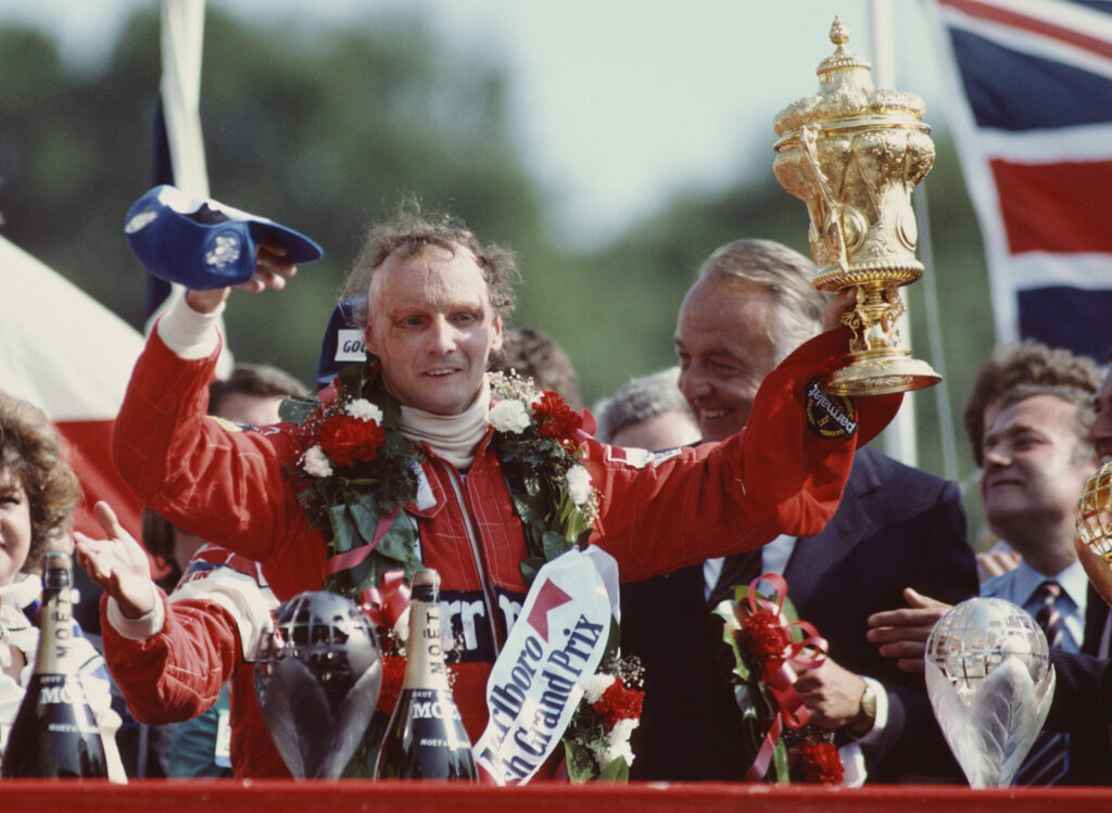 Niki Lauda celebrates winning the 1982 British Grand Prix