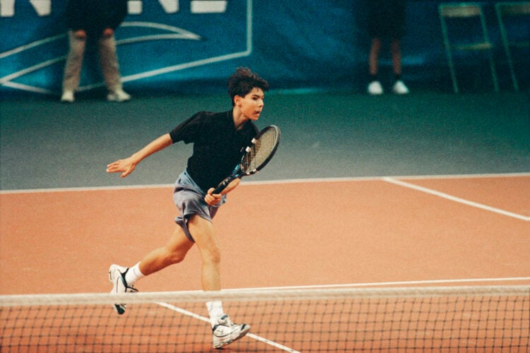 A teenage Rafael Nadal playing a tennis tournament in 2000