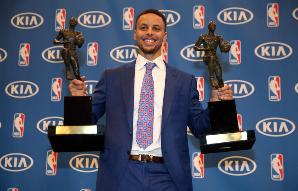 Stephen Curry displays his back-to-back MVP awards in 2016.