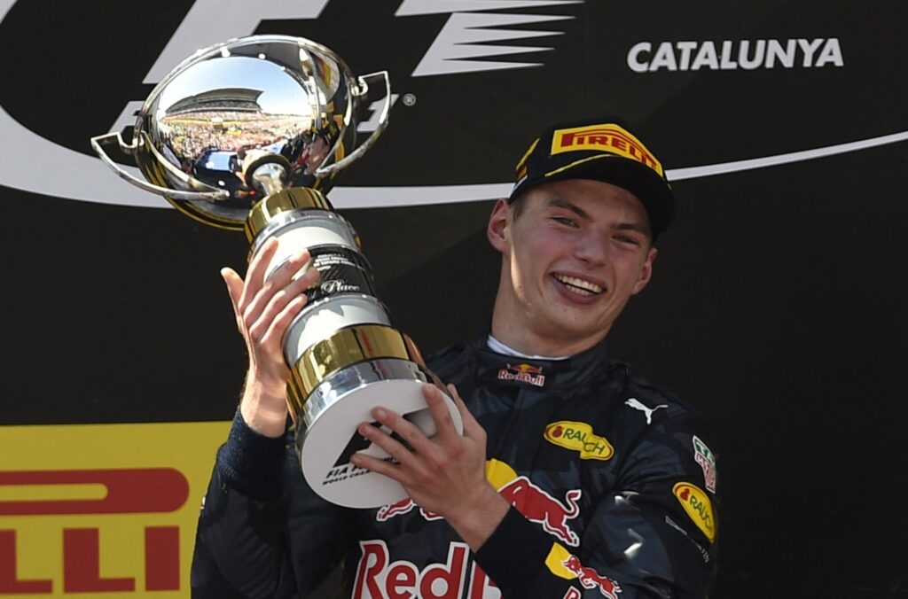 Max Verstappen celebrates on the podium after winning the Spanish Formula One Grand Prix