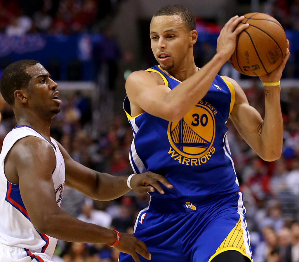 Clippers guard Chris Paul in action against Warriors guard Stephen Curry on Thursday, Oct. 31, 2013