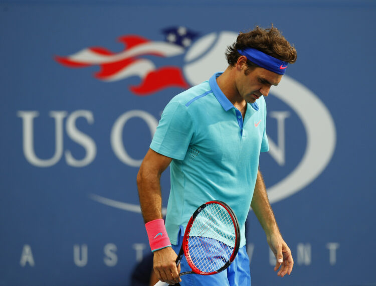 Roger Federer looking defeated against Marin Cilic at the 2014 US Open