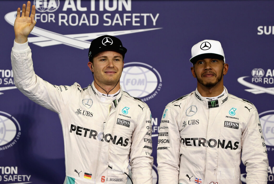 Nico Rosberg and Lewis Hamilton stand together after qualifying for the 2016 Grand Prix of Abu Dhabi.