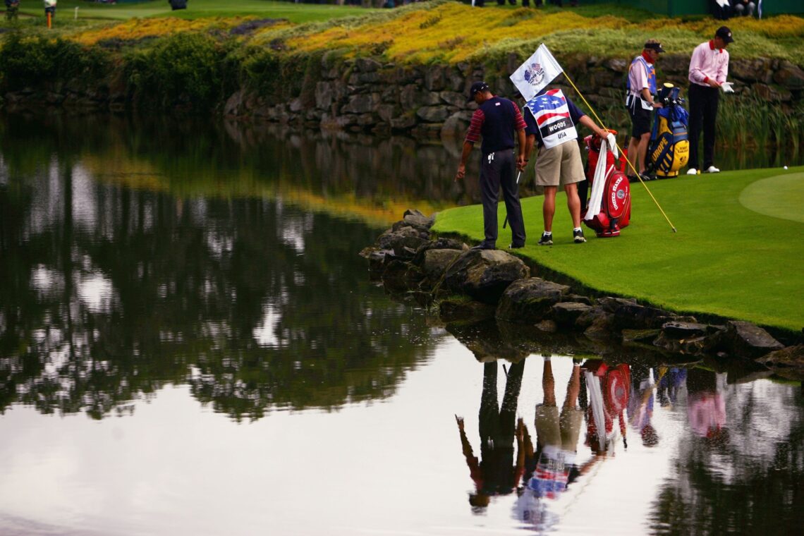 Tiger Woods points to his 9-iron in the lake at the 2006 Ryder Cup