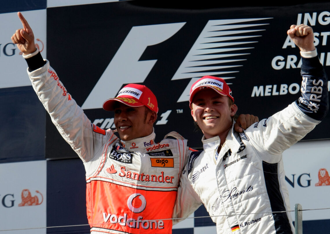 McLaren driver Lewis Hamilton (left) and Williams driver Nico Rosberg (right) celebrating on the podium at the 2008 Formula 1 Australian Grand Prix