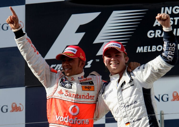 McLaren driver Lewis Hamilton (left) and Williams driver Nico Rosberg (right) celebrating on the podium at the 2008 Formula 1 Australian Grand Prix