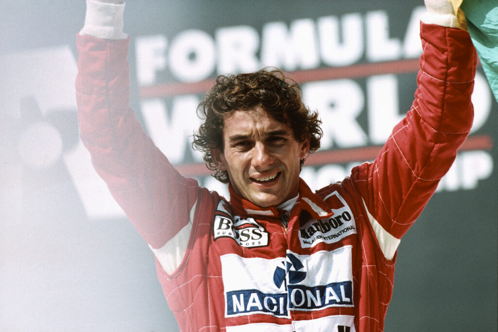 Ayrton Senna celebrates after winning the 1993 Grand Prix Of Brazil.