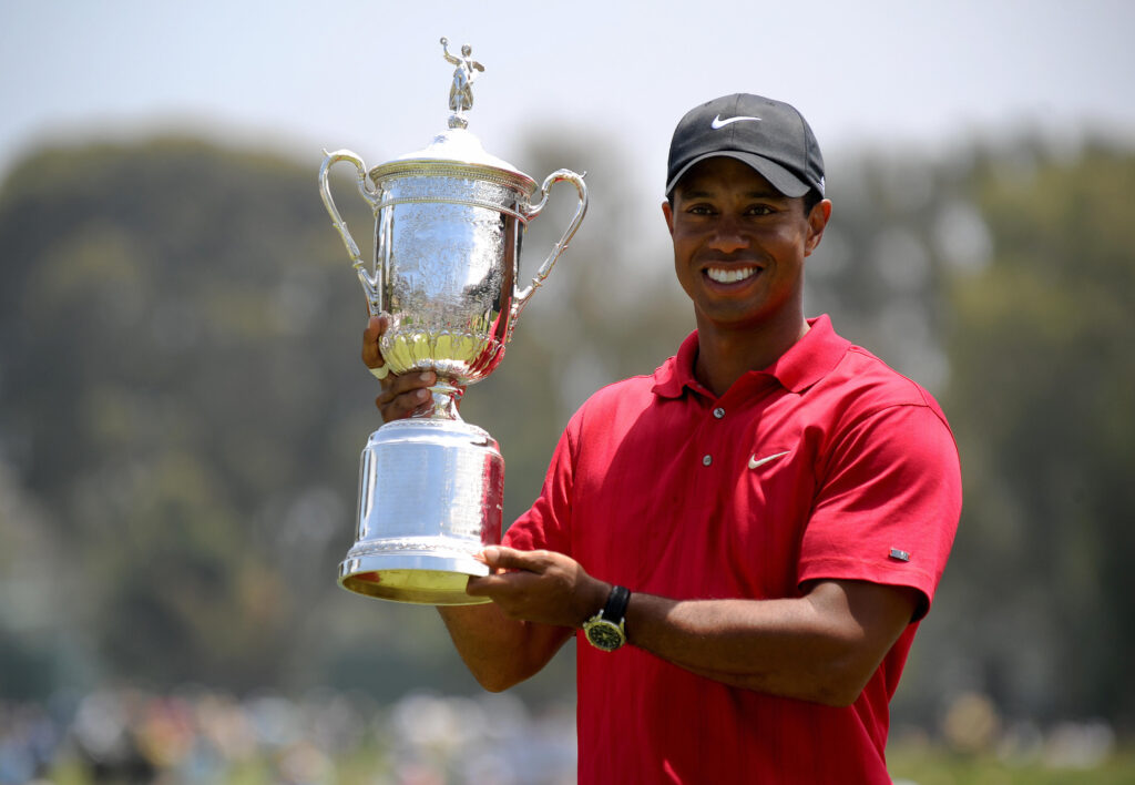 Tiger Woods poses with he The Open Championship trophy