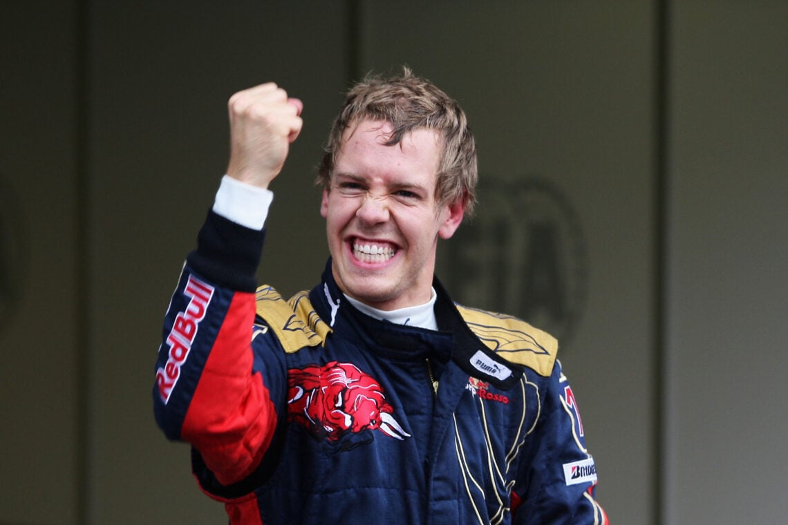Sebastian Vettel celebrates after securing pole position at the 2008 Italian Grand Prix for Toro Rosso.