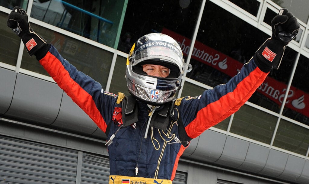 Toro Rosso's German driver Sebastien Vettel celebrates