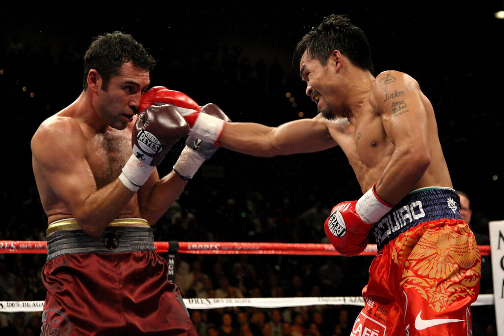 Manny Pacquiao connects with a right hand in his fight against Oscar De La Hoya.