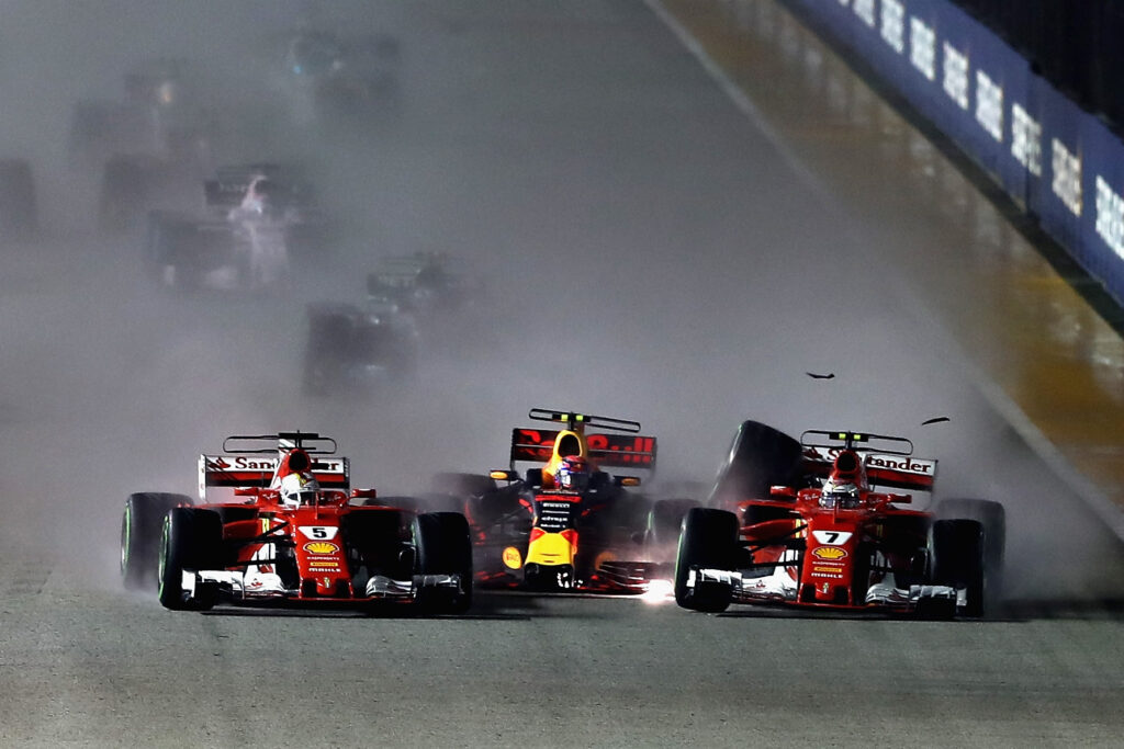 Ferrari's Sebastian Vettel and Kimi Raikkonen crash with Red Bull's Max Verstappen at the start of the 2017 F1 Singapore Grand Prix