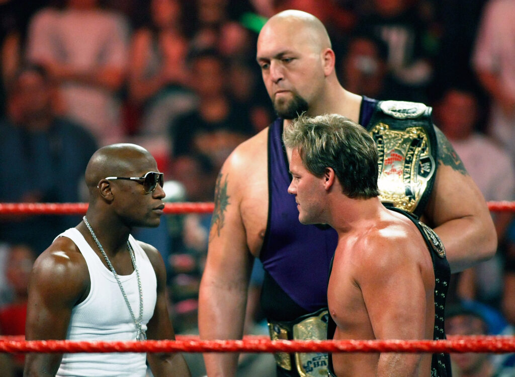 Floyd Mayweather squaring off with Chris Jericho and The Big Show on WWE Raw in 2008