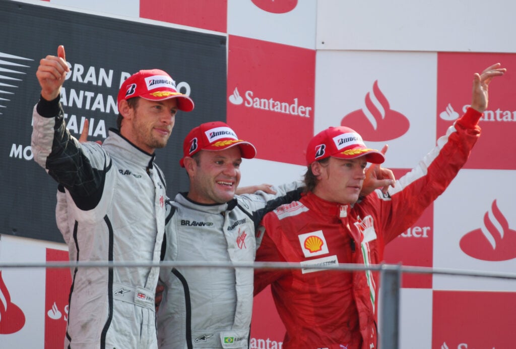 (Left to Right) Jenson Button, Rubens Barrichello and Kimi Raikkonen pose on the podium after the 2009 Italian Grand Prix