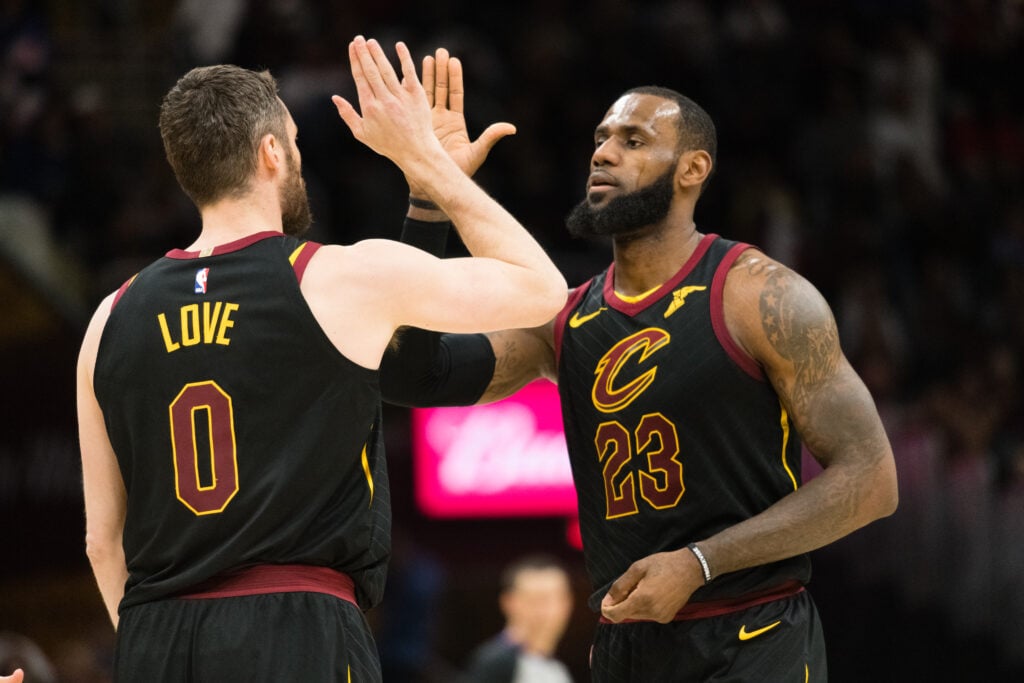Kevin Love #0 celebrates with LeBron James #23 of the Cleveland Cavaliers