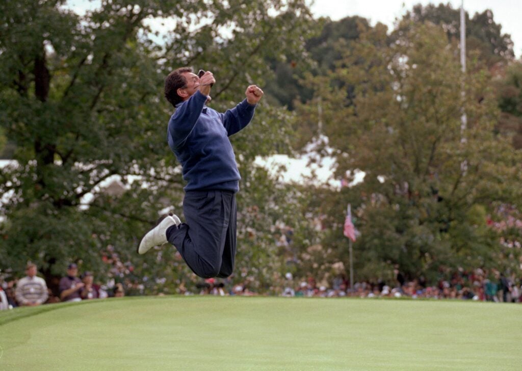 European team captain Bernard Gallacher celebrates at the moment of victory in the Ryder Cup