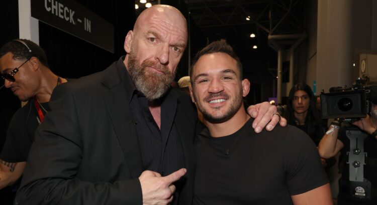 Paul "Triple H" Levesque and Michael Chandler pose at Fanatics Fest NYC 2025