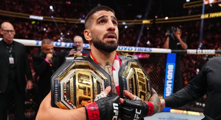 Ilia Topuria reacts after beating Charles Oliveira at UFC 317