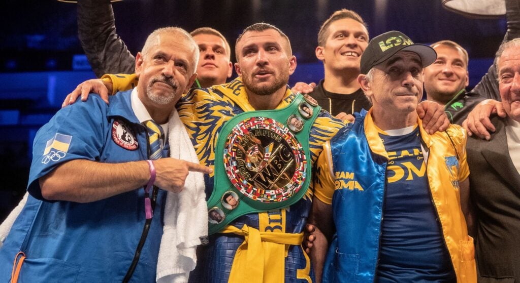 Vasiliy Lomachenko celebrates after beating Luke Campbell in London