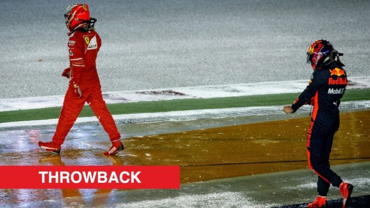 Ferrari's Kimi Raikkonen and Red Bull's Max Verstappen walk away after a crash during the 2017 F1 Singapore Grand Prix