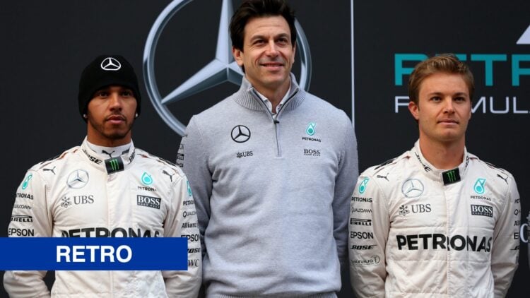 Toto Wolff, Lewis Hamilton and Nico Rosberg pose together outside the Mercedes Formula 1 garage ahead of 2016 winter testing.