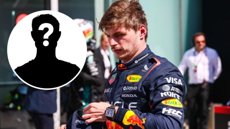 Max Verstappen (right) of Red Bull in Parc ferme during the F1 Grand Prix of Canada, and a mystery person