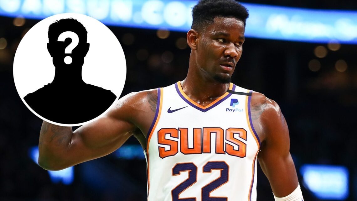 Deandre Ayton (right) playing for the Phoenix Suns, and a mystery person (left)