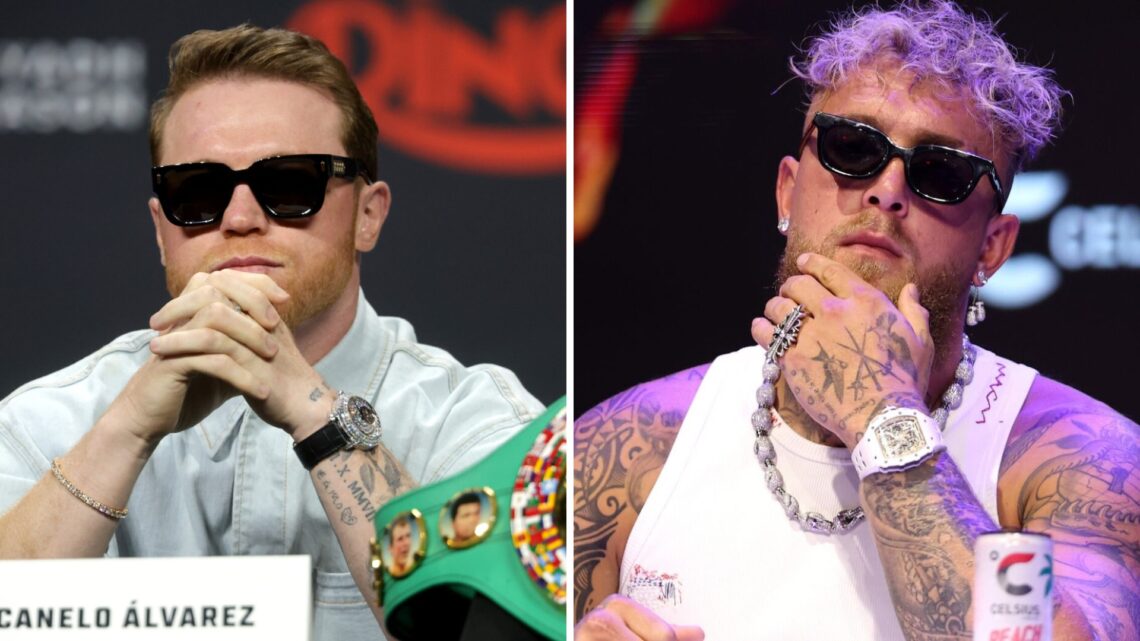 Canelo Alvarez looks at the camera (left) during a press conference, Jake Paul looks on (right)