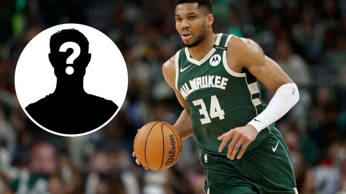 Giannis Antetokounmpo (right) of the Milwaukee Bucks and a mystery person (left)