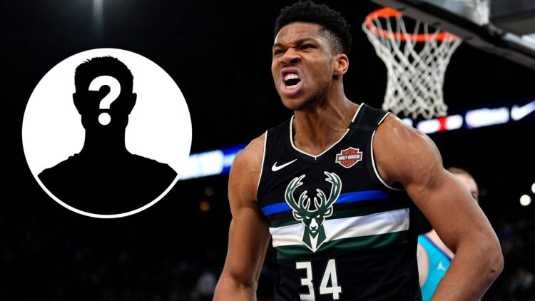 Giannis Antetokounmpo of the Milwaukee Bucks (right) and a mystery person (left)