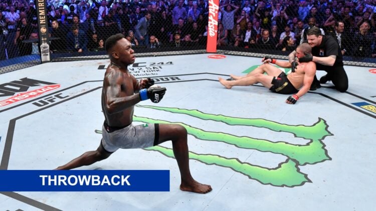 Israel Adesanya (left) celebrates after his knockout victory over Robert Whittaker