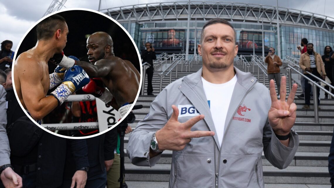 Oleksandr Usyk (right) poses out side of Wembley, Tony Harrison (left) during his WBO super welterweight world title bout