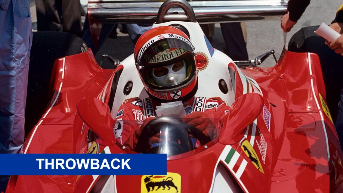 Niki Lauda at the 1977 Spanish Grand Prix with a throwback banner