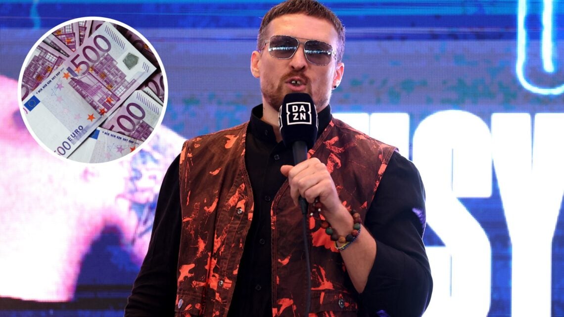 Oleksandr Usyk answers a question from the media during a press conference ahead of his fight with Daniel Dubois, a detailed view of bank notes on ...