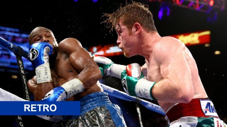 Canelo Alvarez (right) throws a right at Floyd Mayweather Jr (left)