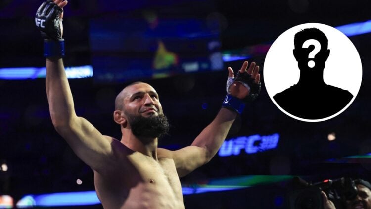 Khamzat Chimaev (left) raises his arms before the UFC 319 event