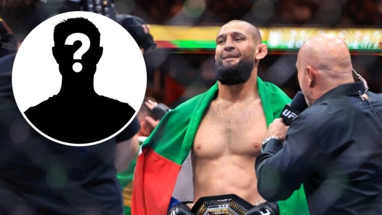 Khamzat Chimaev (left) holds up Dubai flag and speaks to Joe Rogan after UFC 319 win
