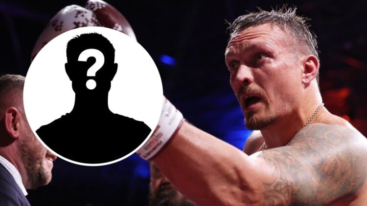 Oleksandr Usyk (left) gestures to crowd after Daniel Dubois win