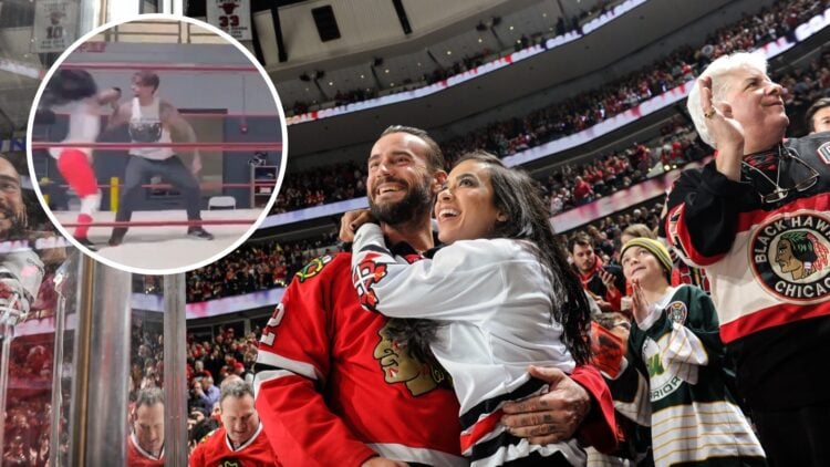 CM Punk and AJ Lee watching a Chicago Blackhawks game in 2015